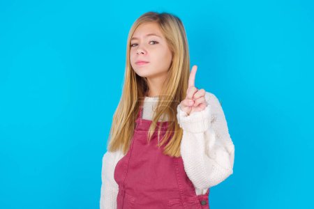 Photo for No sign gesture. Closeup portrait unhappy teen girl raising fore finger up saying no. Negative emotions facial expressions, feelings. - Royalty Free Image