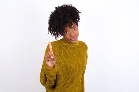 Photo for No sign gesture. Closeup portrait unhappy young woman raising fore finger up saying no. Negative emotions facial expressions, feelings. - Royalty Free Image