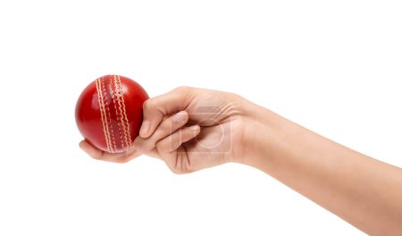 Photo for Female Bowler Grip To The Red Test Cricket Ball Closeup Photo Of Female Cricketer Hand About To Bowl - Royalty Free Image
