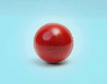 A Shiny New Test Cricket Match Ball Leather Hard Stitched Ball Closeup Photo On Blue Background
