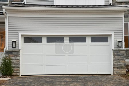 Photo for Modern car garage with automatic door front luxury - Royalty Free Image