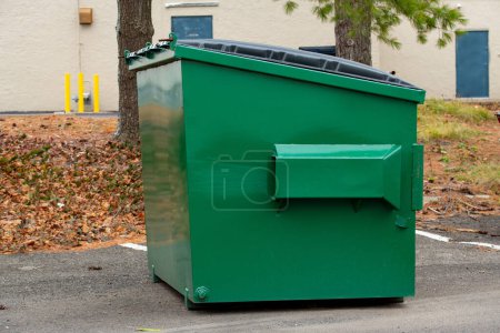 Photo for Large iron dumpster garbage outdoor trash bin junk street metal - Royalty Free Image