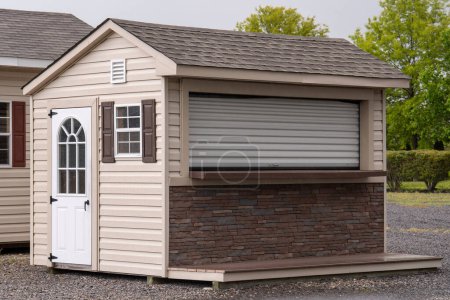Photo for Gray new shed door storage roof modern roof door garden - Royalty Free Image