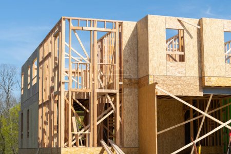 Photo for Two story home under construction plywood frame plank - Royalty Free Image