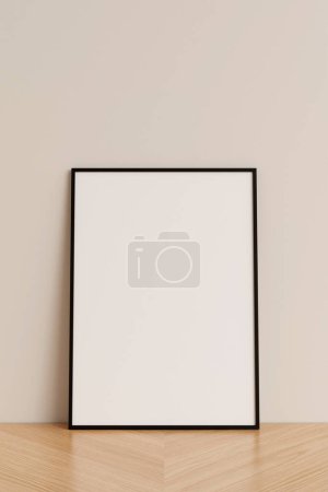 Foto de Vista frontal limpia y minimalista vertical negro foto o cartel marco maqueta apoyada contra la pared en el suelo de madera. renderizado 3d. - Imagen libre de derechos