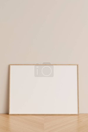 Foto de Limpia y minimalista vista frontal horizontal foto de madera o marco del cartel maqueta apoyada contra la pared en el suelo de madera. renderizado 3d. - Imagen libre de derechos
