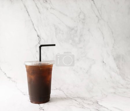 Photo for Asian black Iced coffee on the plastic cup on white marble background. copy space for tour text - Royalty Free Image
