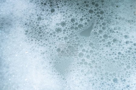 Foto de Espuma abstracta lavavajillas líquido textura fondo - Imagen libre de derechos