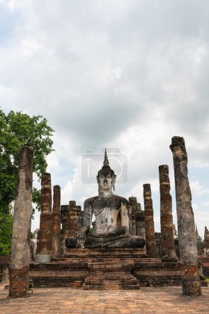 Photo for Buddha at Sukhothai Historical Park It is an important temple of Sukhothai. Inside there is an important historical site. Pagoda Mahathat in the shape of Phum Khao Bin - Royalty Free Image