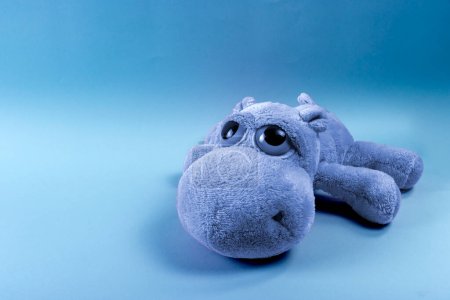 Photo for Blue Monday concept. Sad teddy bear on blue background. - Royalty Free Image