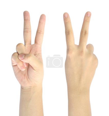 Foto de El símbolo de la victoria de la mano de la mujer aislado sobre fondo blanco - Imagen libre de derechos