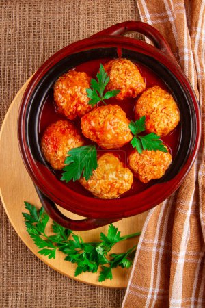 Classic meatballs drenched in savory tomato sauce
