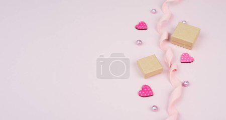 Photo for Valentines day holiday greeting cars with little gift boxes, hearts and perls, love and emotion, pastel colored - Royalty Free Image