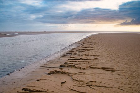 Wadden sea at low tide, North sea beach landscape, coast on Fano island in Denmark