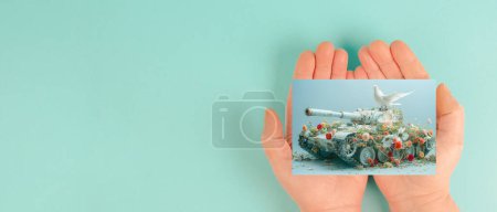 Army tank covered with flowers, dove of peace, ceasefire, end of war, military weapon