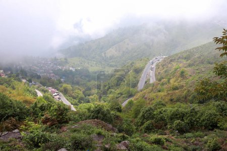 Photo for Countryside landscape of Kurseong in Darjeeling. Beautiful road in the hill town of Kurseong city of Darjeeling in West Bengal of India. - Royalty Free Image
