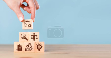 Photo for Woman hand putting wooden cubes with ethics icon. Business ethics concept. Business integrity and moral - Royalty Free Image