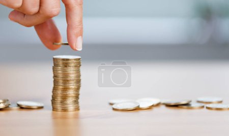 Photo for Hand of female putting coins stack growth value. Concept save money financial business investment. - Royalty Free Image