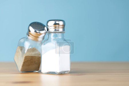 Photo for Salt and pepper shakers on the table - Royalty Free Image