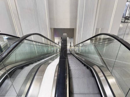 Photo for Escalators stairway. Downward view of escalator - Royalty Free Image