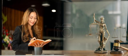 Photo for Legal consultant, professional asian businesswoman or beautiful asian woman lawyer working and hammer, laptop in front, justice and finance concept - Royalty Free Image