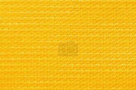 Gelbe Gummistruktur Hintergrund mit nahtlosem Muster.