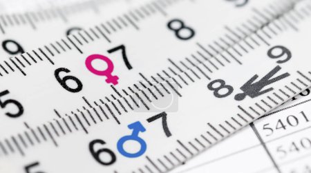 Photo for Concepts of gender equality. Close up view of measuring tape with symbol gender equality. Measure gender inequality. - Royalty Free Image