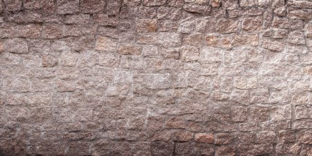 Téléchargez les photos : Vieux fond de mur en pierre claire. Vue frontale rapprochée de la texture du mur de pierre - en image libre de droit