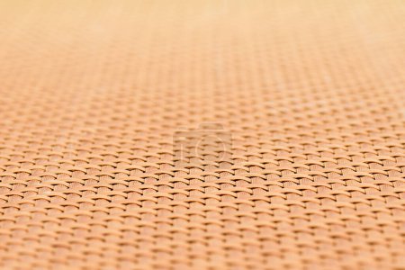 Fondo de patrón tejido marrón, fabricación de productos de muebles de exterior y decoración de diseño de interiores. Material sintético.