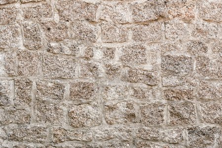 Foto de Fondo de pared de piedra. Vista frontal de primer plano de textura de pared gris claro - Imagen libre de derechos