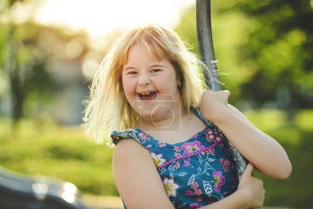A portrait of child girl having fun at the playground