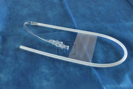 Photo for Umbilical catheter in a sterile surface. Two acess umbilical catheter in the protective case - Royalty Free Image