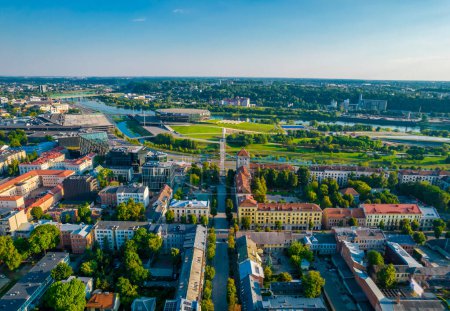 Kaunas city center and Freedom Avenue, Laisves aleja in Lithuania. Aerial drone view of alley in summer.
