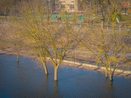 Aerial view of spring flood in the middle of the city. Covered embankments, trees in Kaunas old town, Lithuania