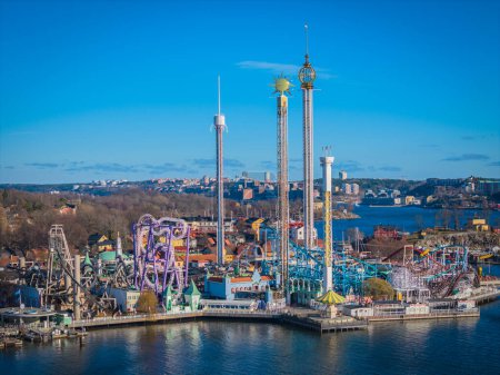 Amusement park Grona Lund in Djurgarden, Stockholm. Aerial view of Sweden capital. Drone top panorama photo