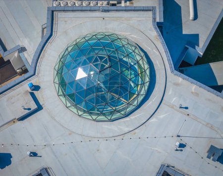 Aerial view of glass dome on the roof on a SPA resort roof in Birstonas, Lithuania