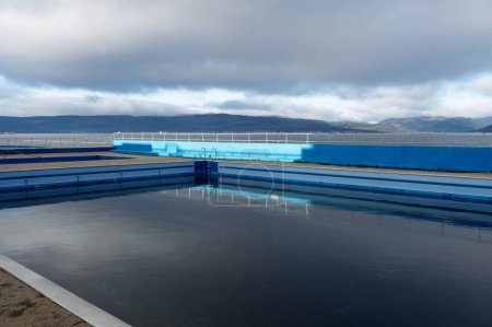 Photo for Outdoor open air swimming pool closing for maintenance in Gourock UK - Royalty Free Image