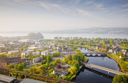 Photo for Dumbarton town aerial view with the River Leven and Dumbarton rock castle UK - Royalty Free Image