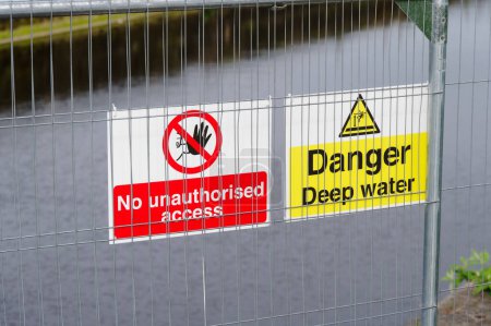 Photo for Deep water danger sign at rivers edge UK - Royalty Free Image