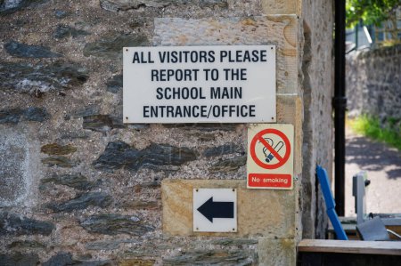 Photo for All school visitors report to main office sign UK - Royalty Free Image