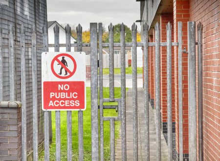 Photo for No public access sign on entrance gate to factory UK - Royalty Free Image