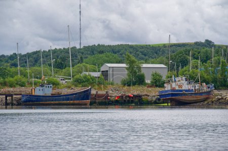 Photo for Old steel blue boat moored in the west coast highlands, Scotland, UK - Royalty Free Image