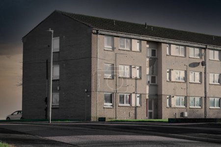 Photo for Council flats in poor housing estate with many social welfare issues at Torry in Aberdeen UK - Royalty Free Image