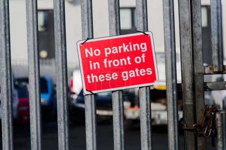 Photo for No parking in front of these gates sign UK - Royalty Free Image