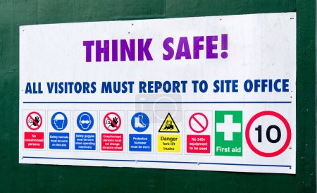 Photo for Construction site health and safety sign on fence UK - Royalty Free Image