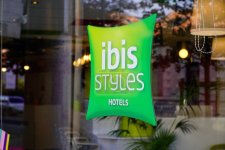 Photo for Bordeaux , Aquitaine  France - 10 30 2022 : ibis styles green pillow sign logo and brand text hotel wall entrance facade building windows - Royalty Free Image