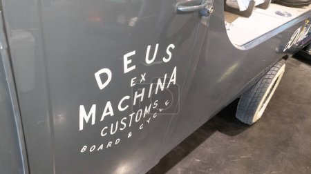 Photo for Bordeaux , Aquitaine  France - 11 06 2022 : Deus Ex Machina brand logo and sign text on custom car side fashion clothes motorbike concept coffee store - Royalty Free Image