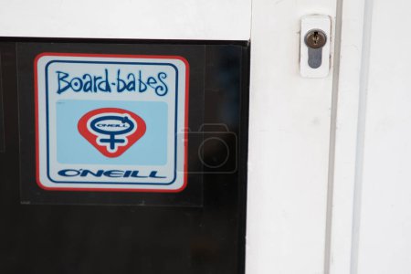 Foto de Burdeos, Aquitania Francia - 12 01 2022: o 'neill board babes surf shop brand sign and text store logo brand oneill in entrance door - Imagen libre de derechos