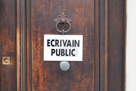 Photo for Ecrivain public french panel text means Public letter writer sign on wooden door in France - Royalty Free Image