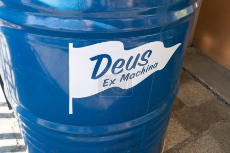 Photo for Bordeaux , Aquitaine France - 12 12 2022 : Deus Ex Machina logo text and brand sign on barrel oil fashion boutique clothing concept shop - Royalty Free Image